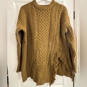 J Crew olive green long sweater. Has a slit at bottom with fringe detail.